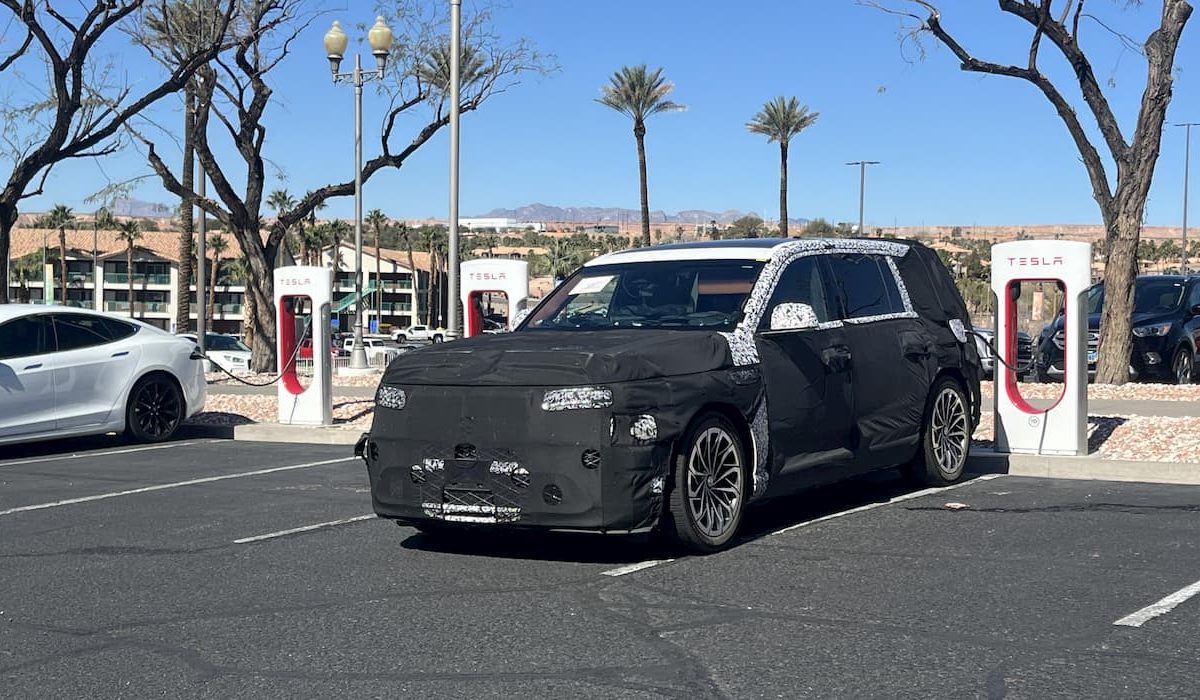 Genesis GV90 Spotted Charging at Tesla Supercharger Ahead of Launch