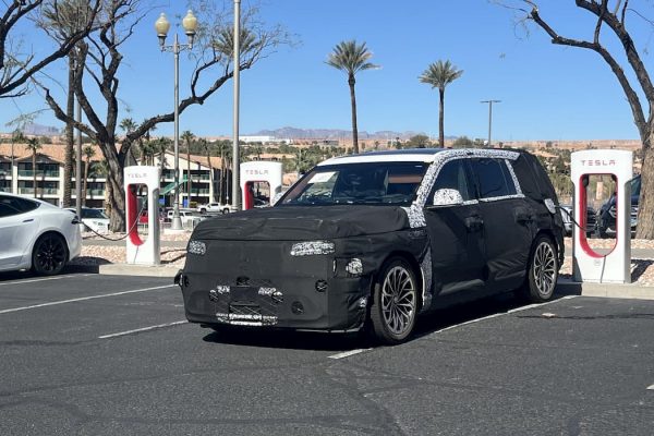 Genesis GV90 Spotted Charging at Tesla Supercharger Ahead of Launch